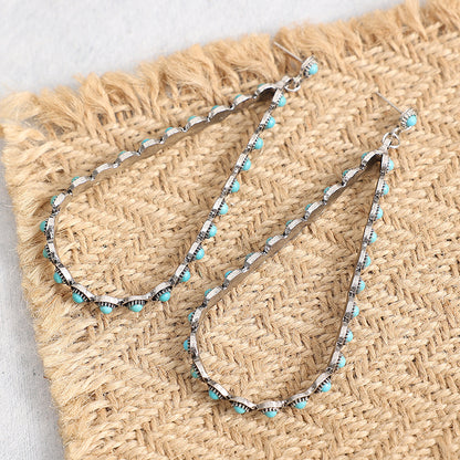 Hollowed-out Large Teardrop Turquoise Earrings